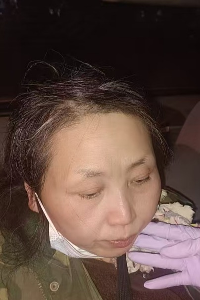 走失者照片 大连市寻亲：五旬女子被救助，穿绿色...