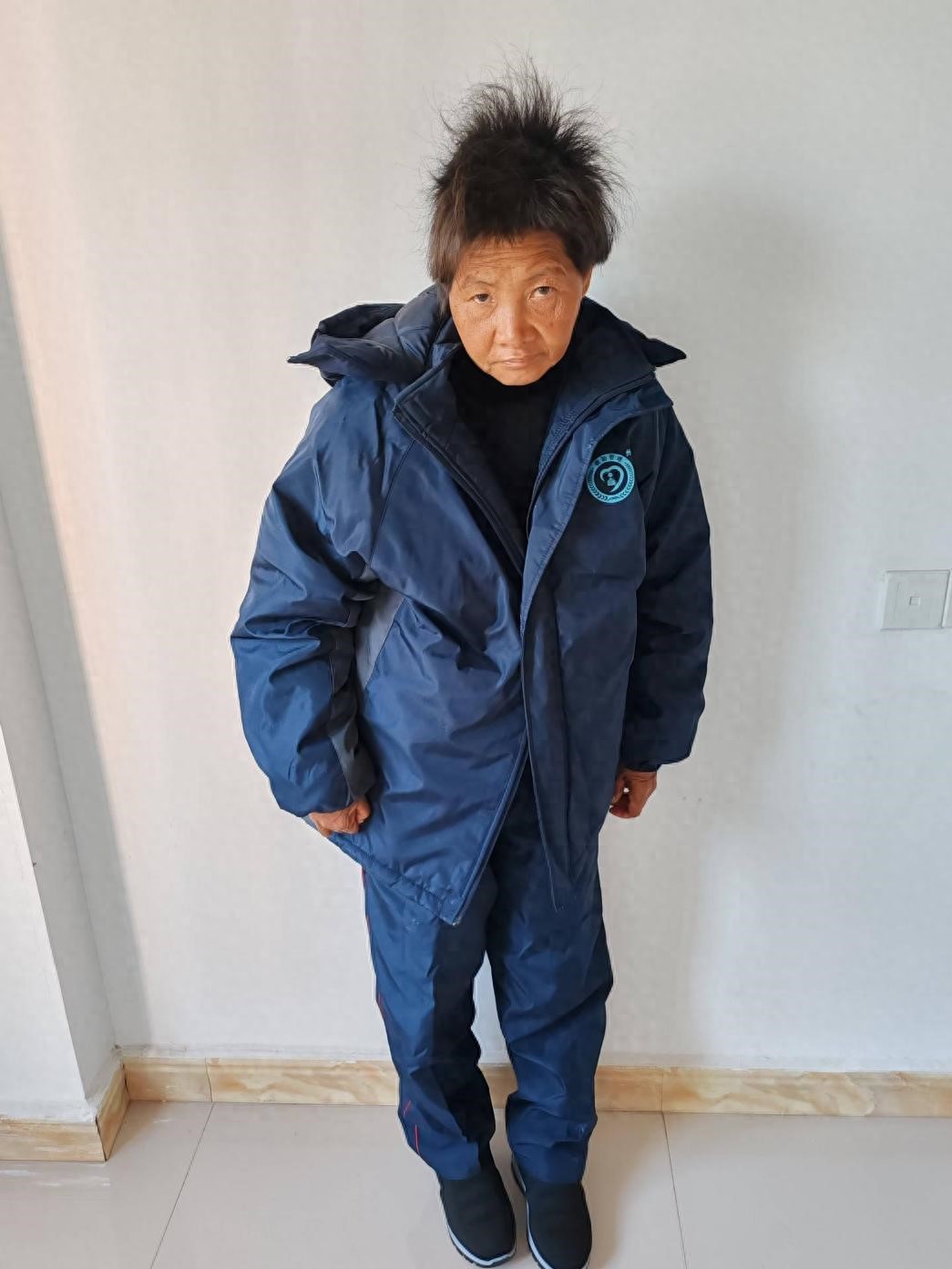 走失者照片 抚州市寻亲：五旬女子被救助，穿蓝色...