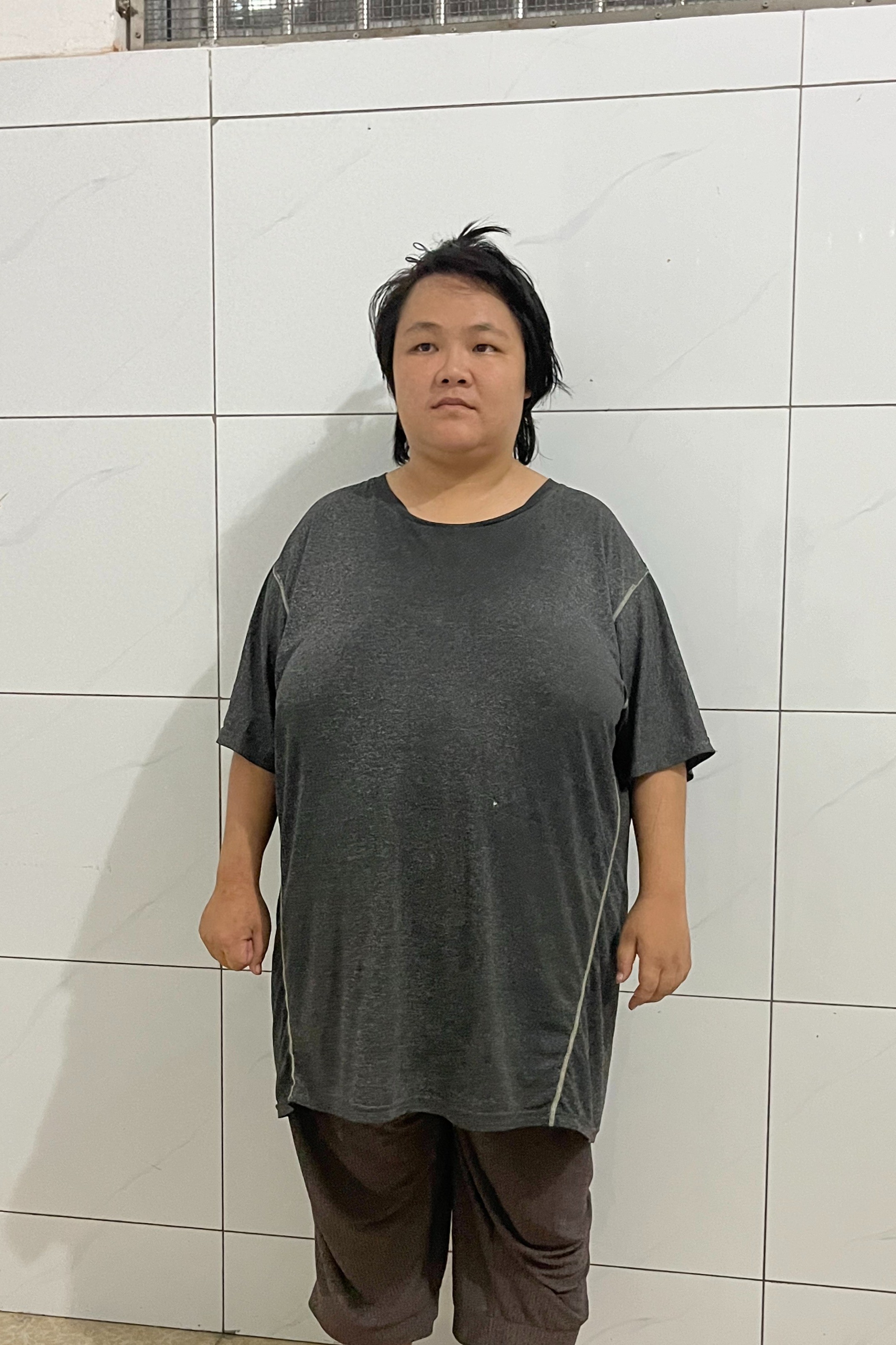 走失者照片 玉林市寻亲：青年女子被救助，穿黑色...