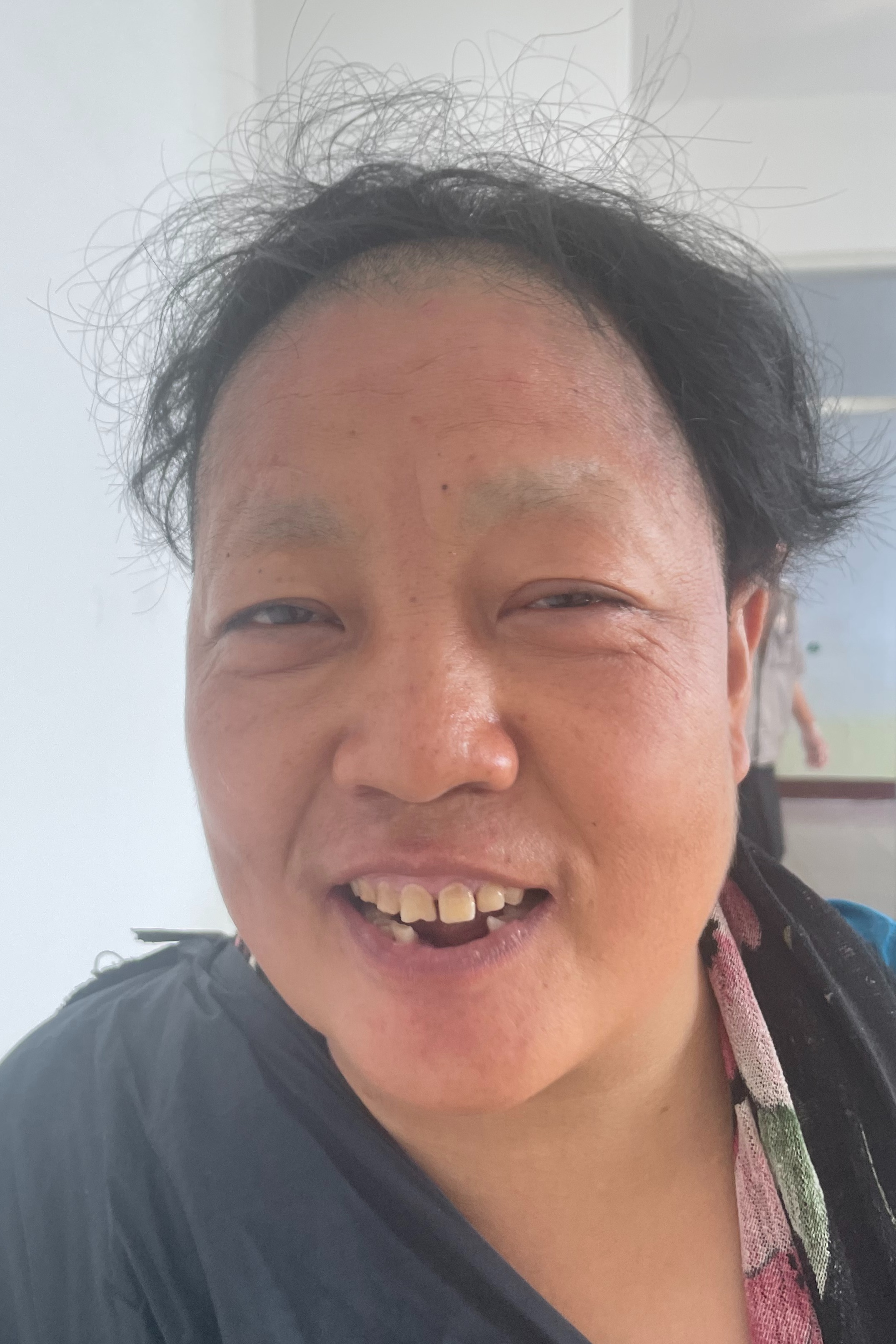 走失者照片 临汾市寻亲：五旬女子被救助，穿蓝色...