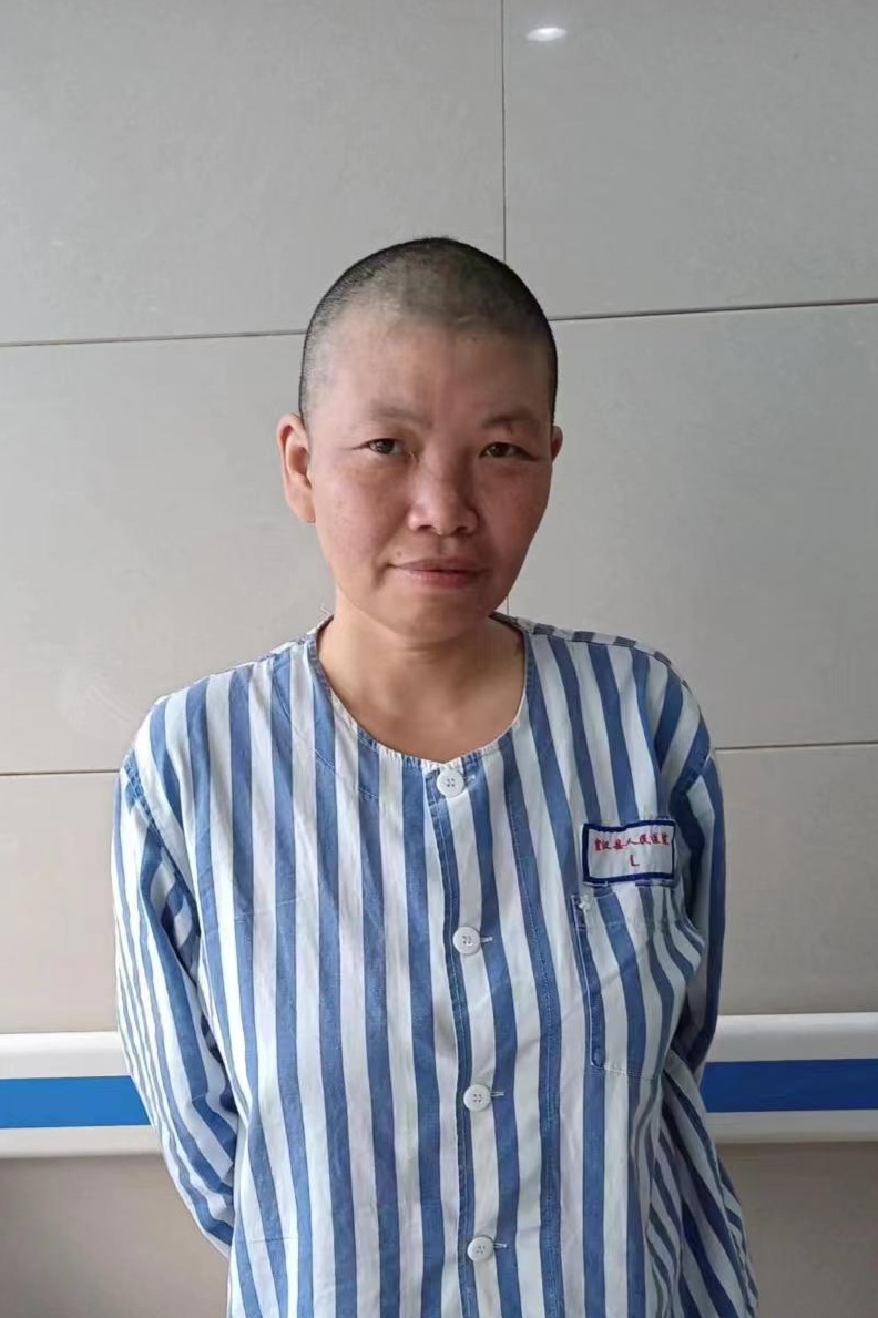 走失者照片 达州市寻亲：中年女子被救助，穿条纹...