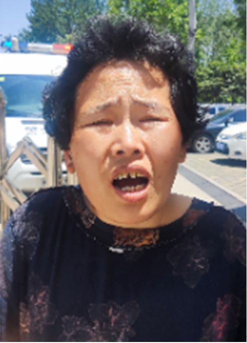 走失者照片 菏泽寻亲：五旬女子被救助，穿黑色长...