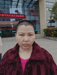 走失者照片 遂宁寻亲：中年女子被救助，穿红色外...