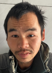 走失者照片 贵港寻亲：青年男子被救助，穿军绿色...