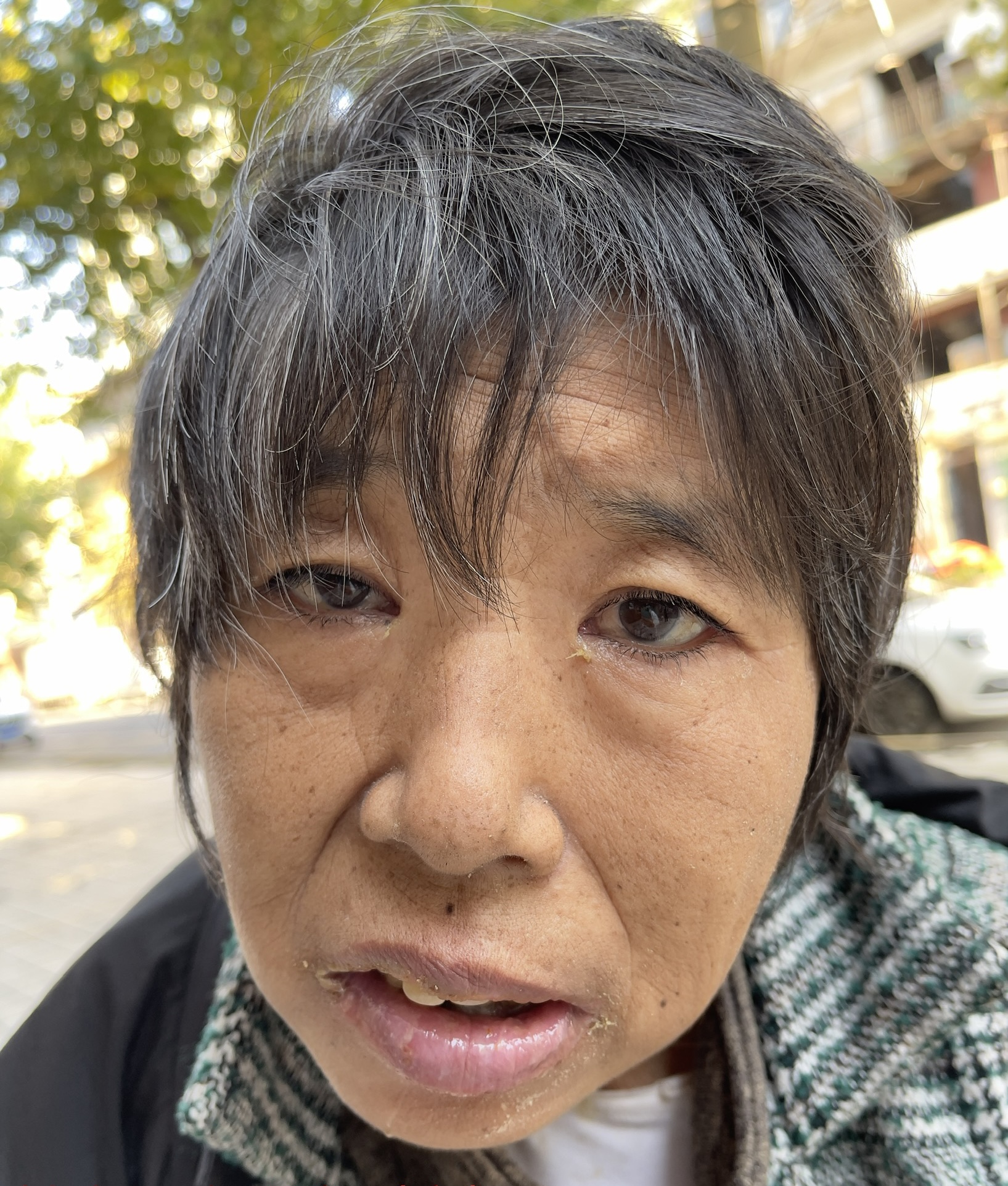 走失者照片 哈尔滨寻亲：五旬女子被救助，穿黑色...