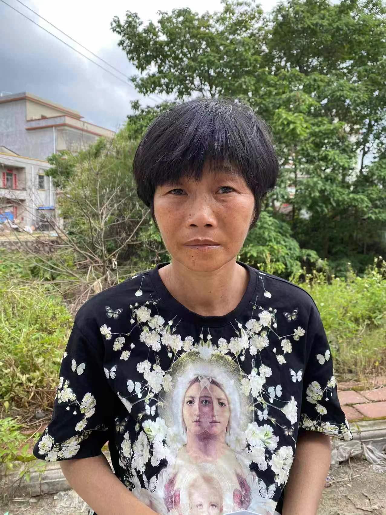 走失者照片 北海寻亲：五旬女子被救助，穿黑底白...