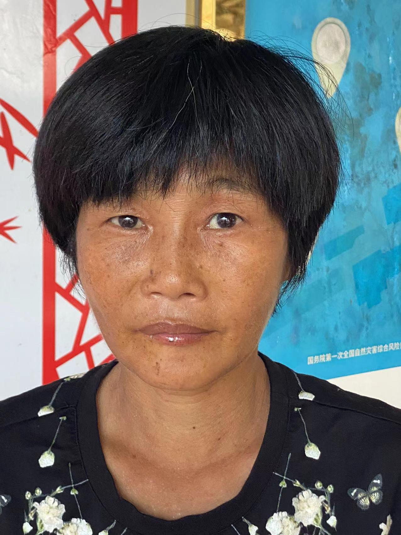 走失者照片 北海寻亲：五旬女子被救助，穿黑底白...